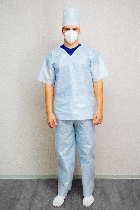 Single-use protective suit with straps