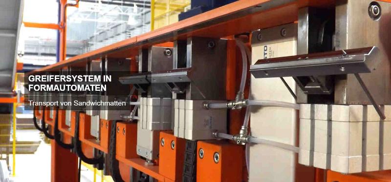 Gripper systems in automatic molding machines
